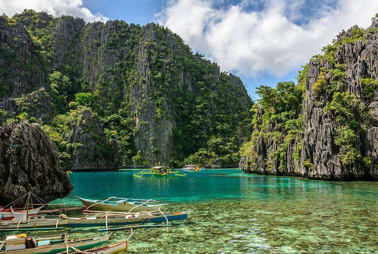 Philippine boats in the lagoon of Coron Island, Palawan, Philippines. Asia